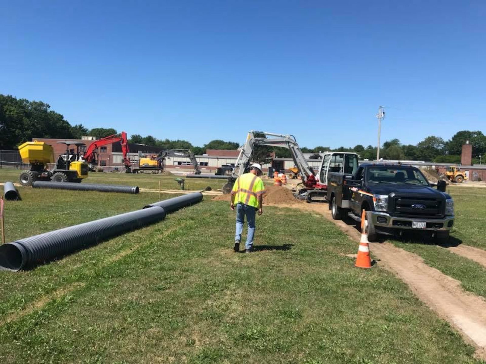 Athletic Fields: Woods crew and equipment on the job