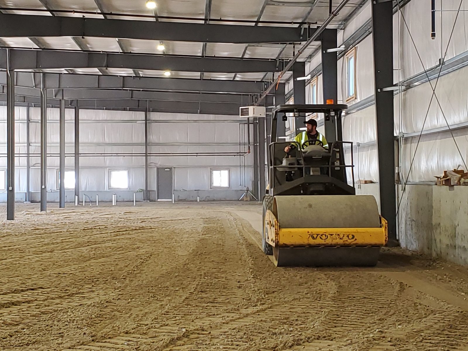 Interior Excavation & Fine Grade: Woods crew and equipment on the job