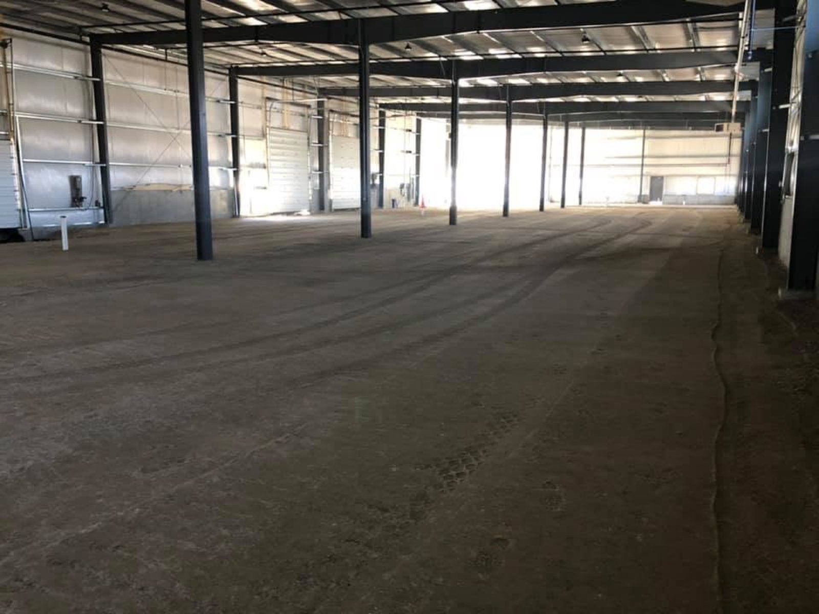 Interior Excavation & Fine Grade: Woods crew and equipment on the job