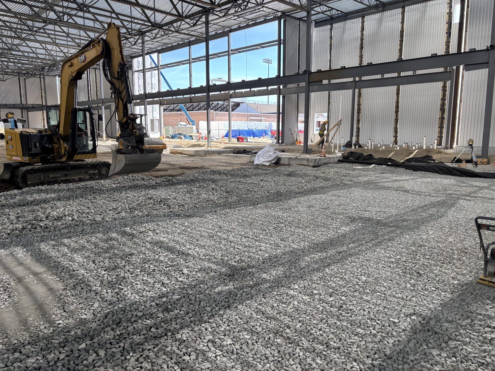Interior Excavation & Fine Grade: Woods crew and equipment on the job
