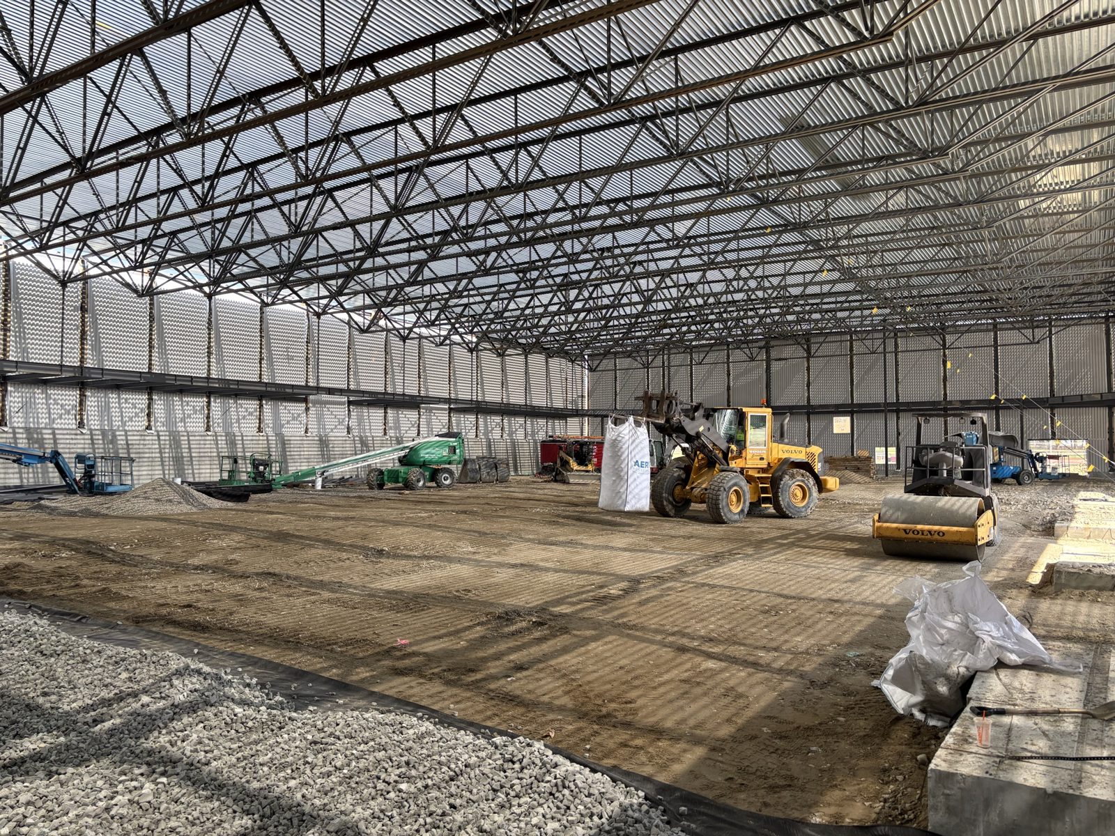 Interior Excavation & Fine Grade: Woods crew and equipment on the job