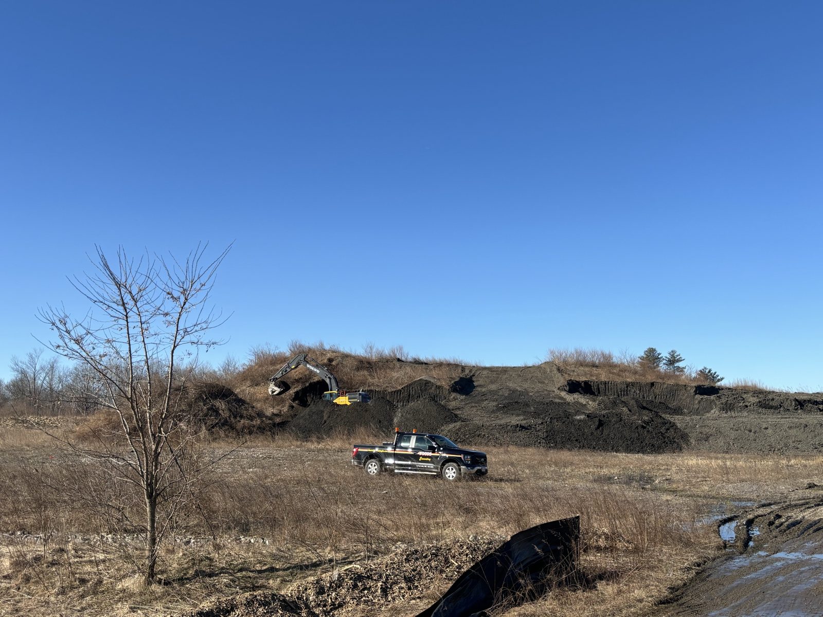 Landfills & Regulated Sites: Woods crew and equipment on the job