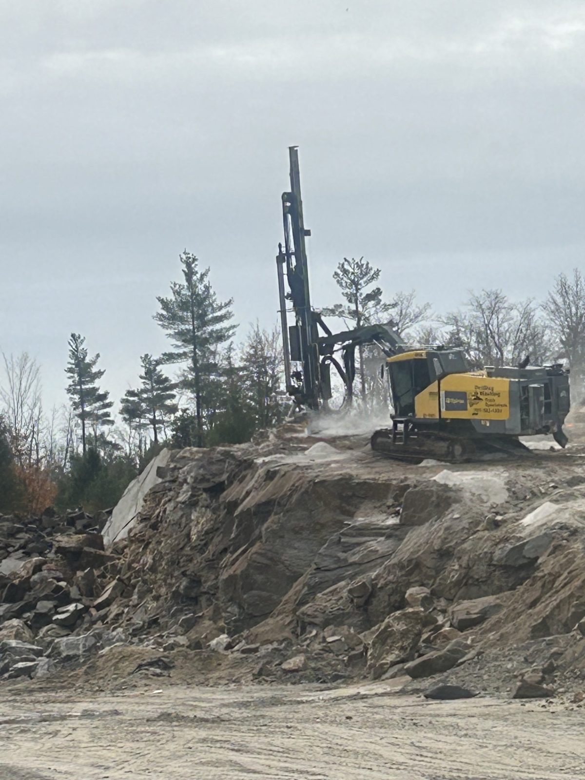 Ledge Removal and Processing: Woods crew and equipment on the job