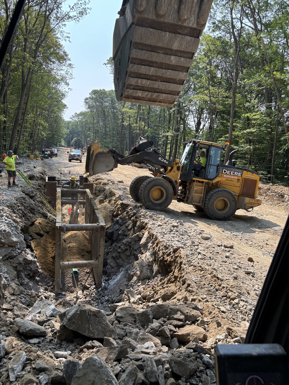 Sanitary Sewer: Woods crew and equipment on the job