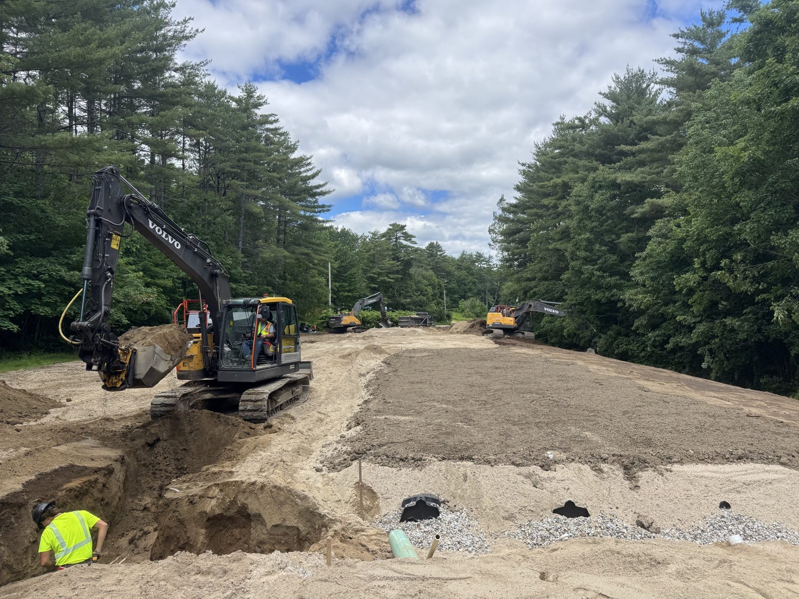 Sanitary Sewer: Woods crew and equipment on the job