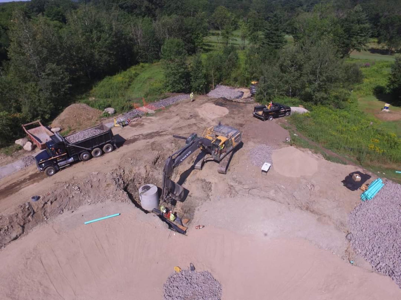 Storm Water: Woods crew and equipment on the job
