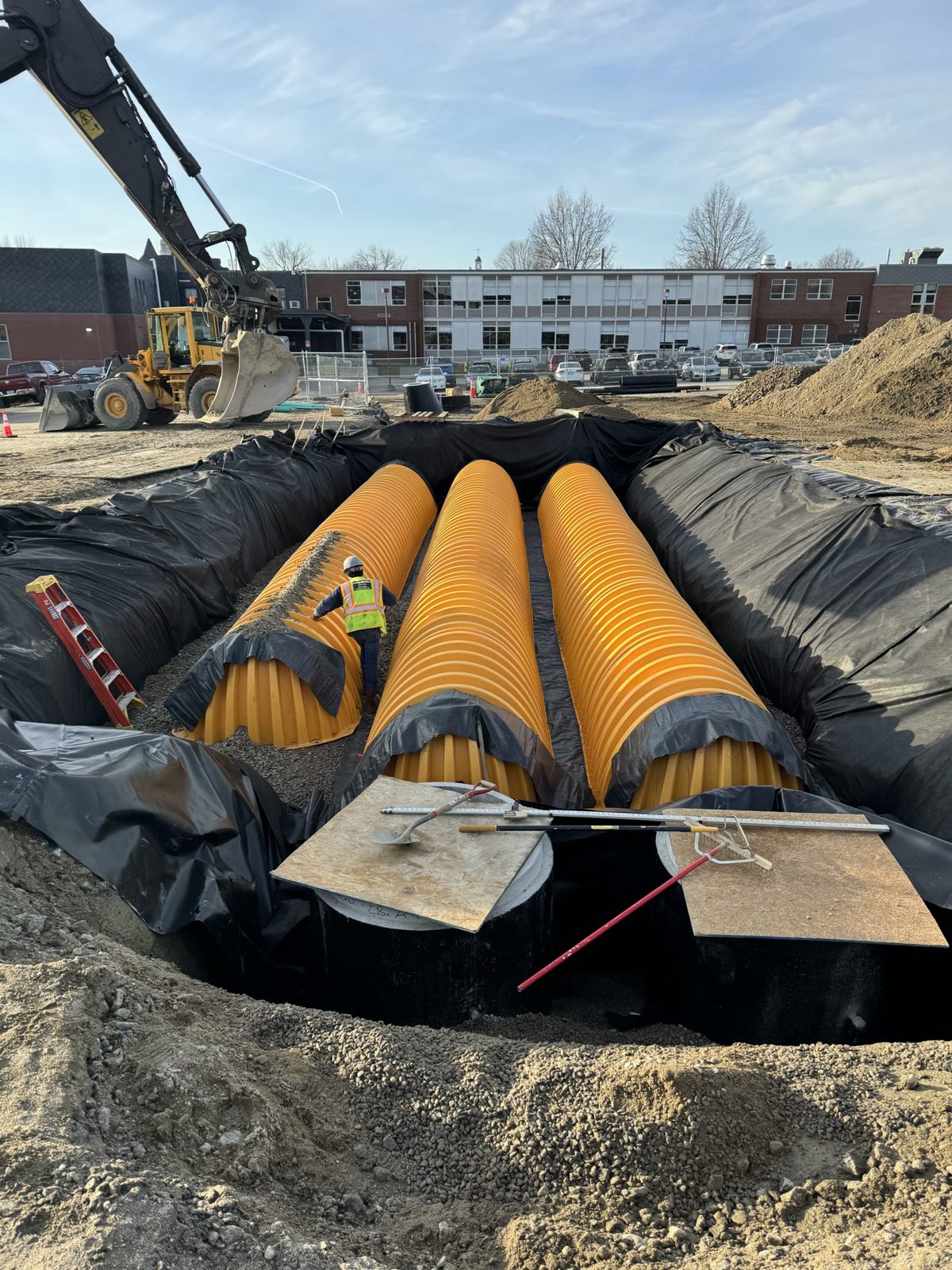 Storm Water: Woods crew and equipment on the job