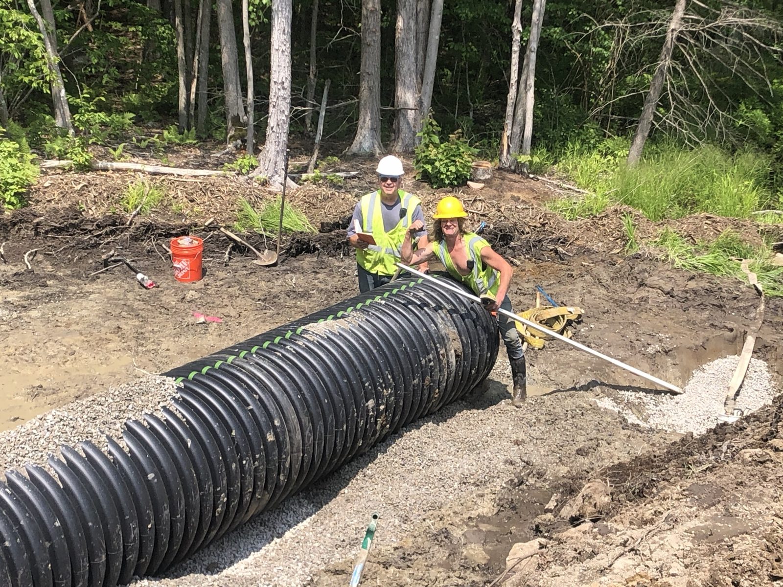 Storm Water: Woods crew and equipment on the job
