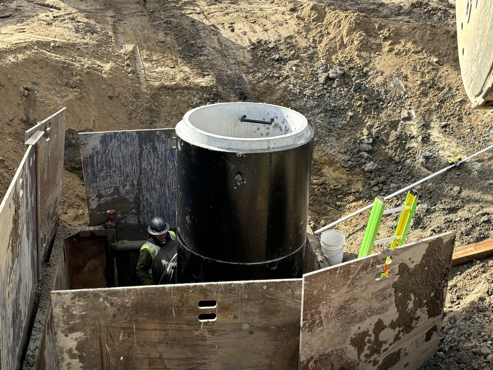 Storm Water: Woods crew and equipment on the job