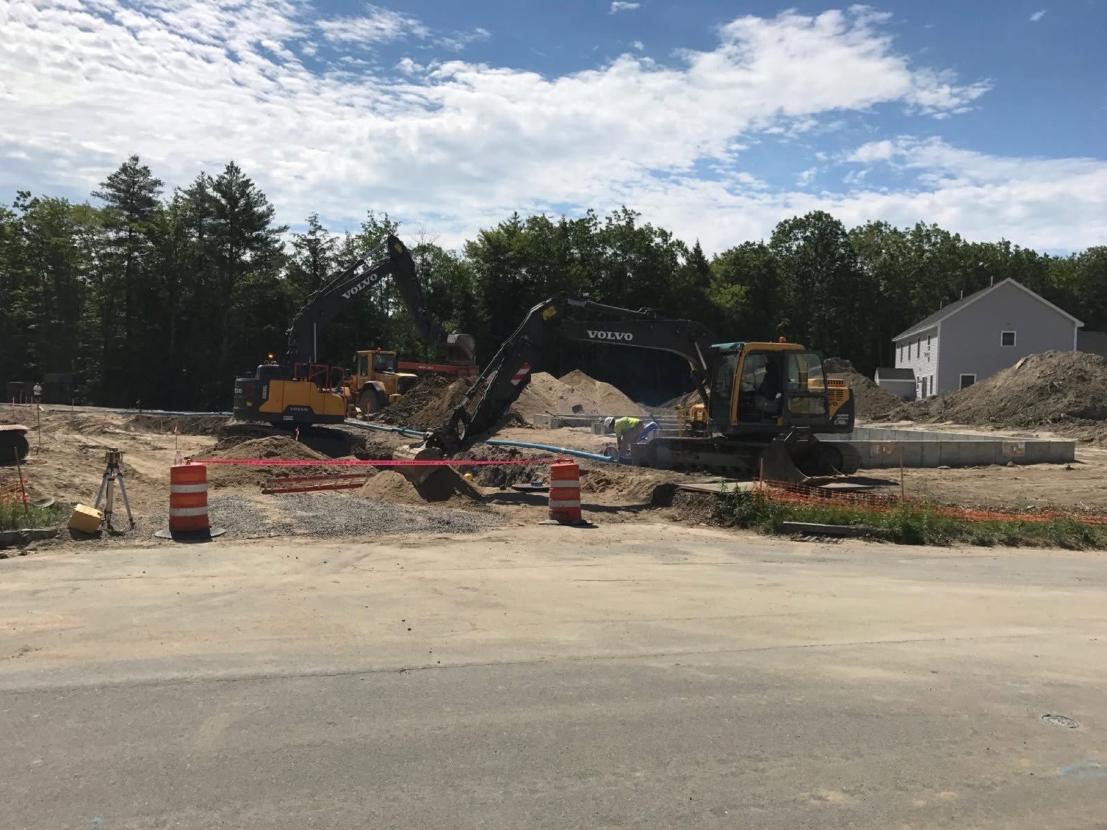 Subdivisions: Woods crew and equipment on the job